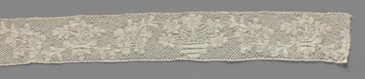 Strip of bobbin lace with flower pots between S-shaped flower branches