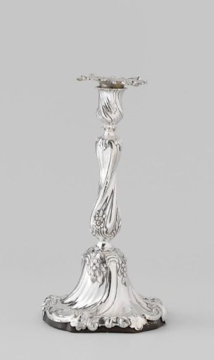 Candlestick of cast silver with bell-shaped foot