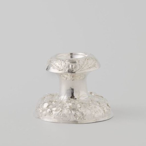 Salt cellar with chased fish, shells and sea creatures