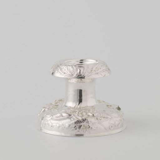 Salt cellar with chased fish, shells and sea creatures