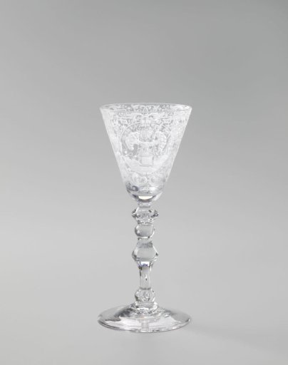 Wine glass with depictions of marriage and fertility