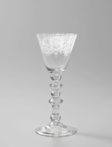 Wine glass with depictions of marriage and fertility