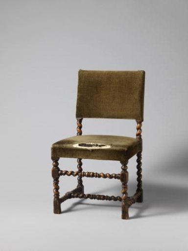Chair in neo-Renaissance style with scrolled parts and upholstered seat.