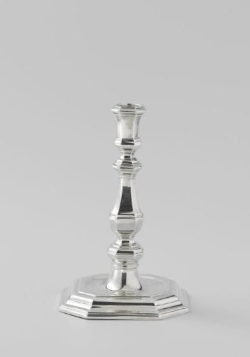 Candlestick with baluster-shaped stem and square foot with chamfered corners