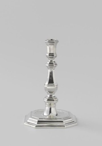 Candlestick with baluster-shaped stem and square foot with chamfered corners