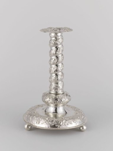 Candelabrum with a twisted stem, decorated with flowers and putti