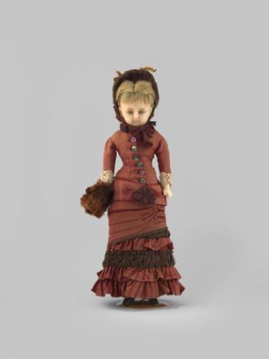 Doll with Wax Head and Blonde Hair; Body Filled with Bran; Arms and Lower Legs of Porcelain with Painted Black Button Boots