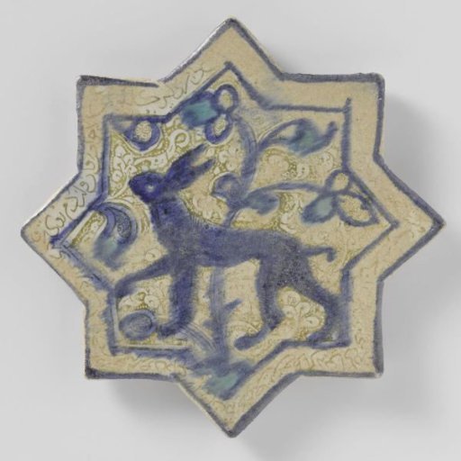 Tile in the shape of a star with a hare and inscription