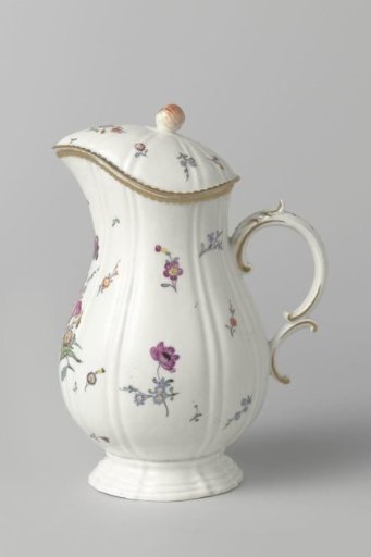Two small jugs with lids