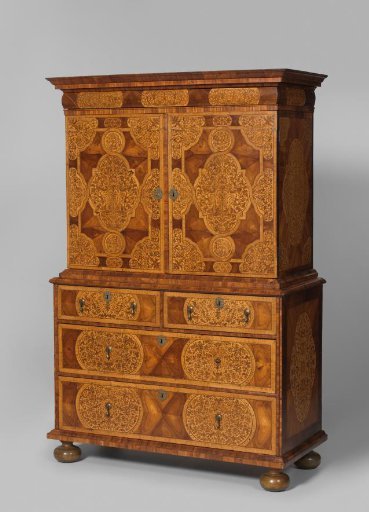 Cabinet, decorated with marquetry, consisting of a lower section with two large and two small drawers and an upper section with two doors