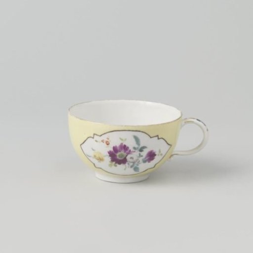 Head, polychrome painted with Deutsche Blumen in cut-out quatrefoils on a yellow ground