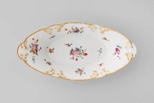 Dish with bouquets and flower sprays