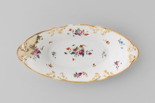 Dish with bouquets and flower sprays