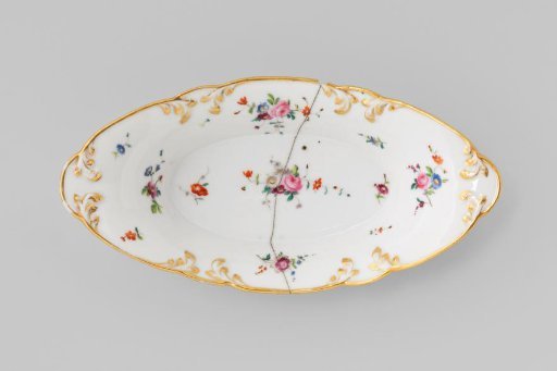 Dish with bouquets and flower sprays