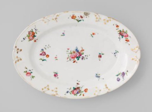 Dish with bouquets and flower sprays