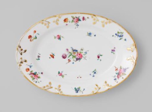 Dish with bouquets and flower sprays
