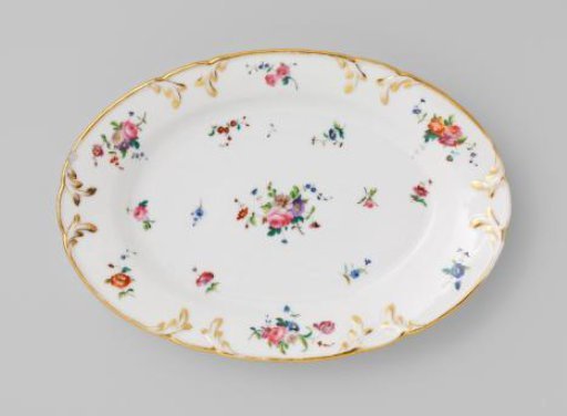 Dish with bouquets and flower sprays