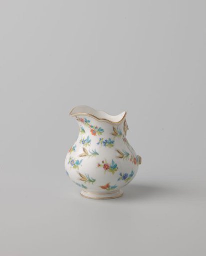 Milk jug with flower sprays