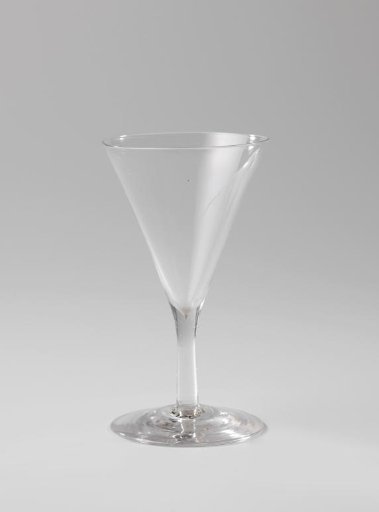 Chalice glass, funnel-shaped with an unadorned cylindrical stem and round foot