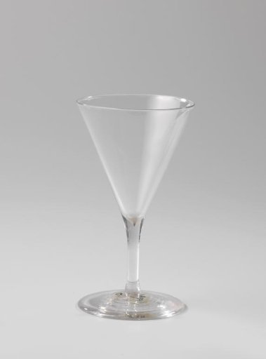 Chalice glass, funnel-shaped with an unadorned cylindrical stem and round foot