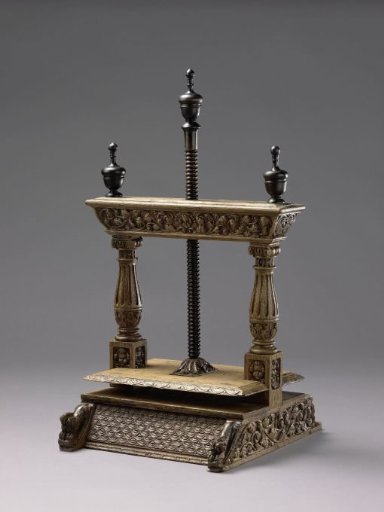 Linen press with scaffold styles in the form of Ionic columns.