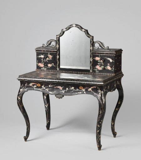 Toilet table of black lacquer with flower branches and birds of inlaid mother-of-pearl.
