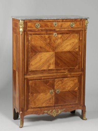 Secretary inlaid with rosewood and maple and with blue-grey veined marble slab. Two lower doors, a drop-leaf and a drawer. Mountings of gilded copper or bronze
