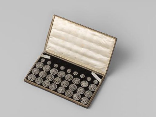 Box of black leather with 24 large and 9 small buttons of rhinestone