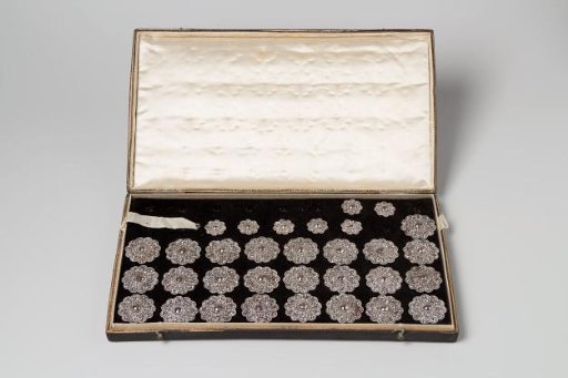 Box of black leather with 25 large and 16 small buttons of cut steel