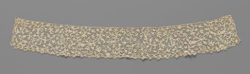 Strip of needle lace with richly branched spiral vines