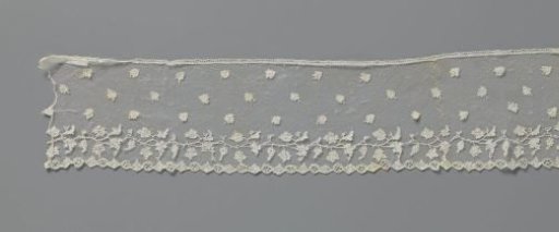 Strip of appliqué lace with vine