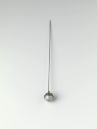 Hatpin with a knob of a small silvered sphere set in copper sepals
