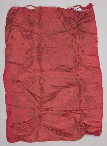 Silk damask in wine-red with a pattern of a grid formed by ermine draperies