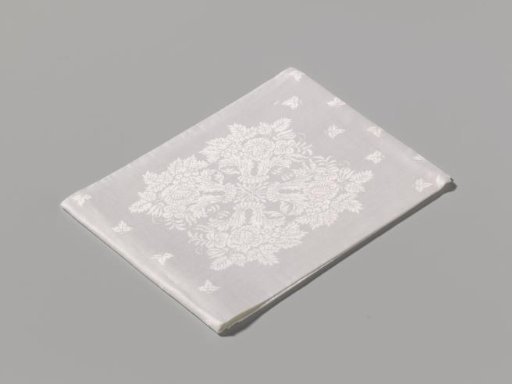 Napkin with a herm, god and lions amidst acanthus leaves