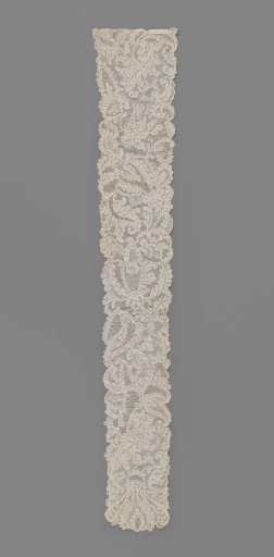 Caplet of needle lace with acanthus leaves