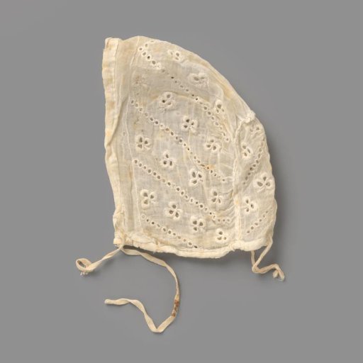 Child's Cap of Transparent Woven White Cotton with Open Embroidery with Chain Borders and Loose Flower Motifs