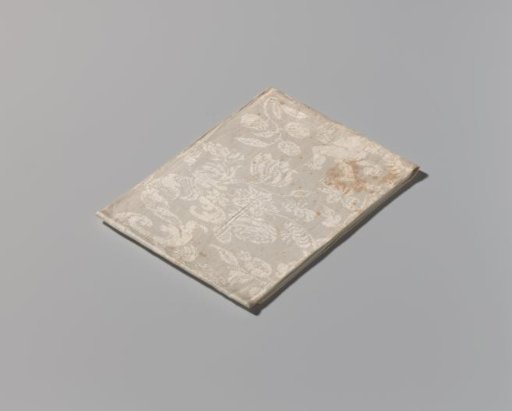 Napkin with putti, cornucopias, fruits, flowers and a flower basket