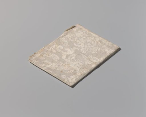 Napkin with putti, cornucopias, fruits, flowers and a flower basket