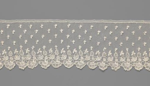 Strip of needle lace with fan-shaped leaves