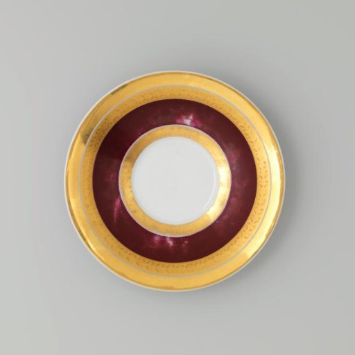 Saucer with gold borders on a red ground