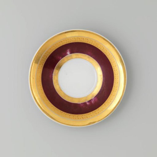 Saucer with gold borders on a red ground