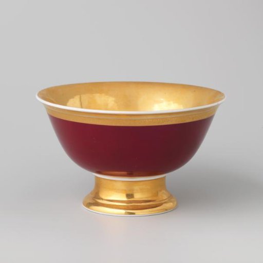 Bowl with gold borders on a red ground