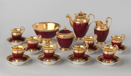 Service with gold borders on a red ground