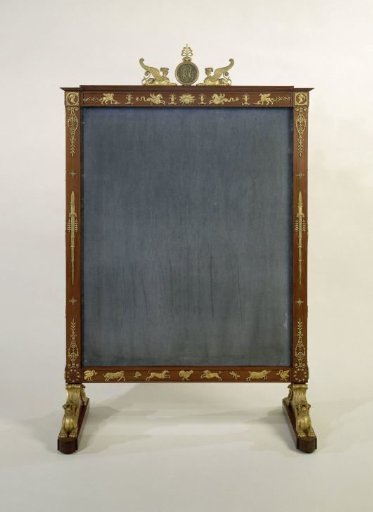 Fire screen of mahogany, rectangular, on triangular feet with winged half-lions.
