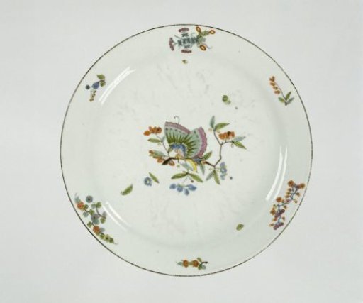 Plate, multicolored painted with flower branches and a butterfly