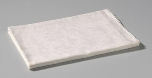Tablecloth with bandwork and volutes