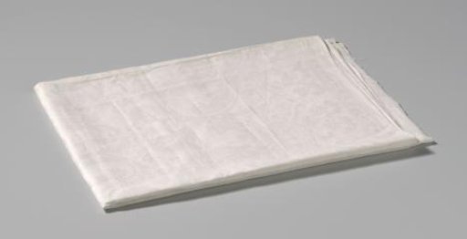 Fragment of a linen damask tablecloth with bandwork and volutes