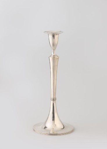 Silver candlestick on trumpet-shaped foot