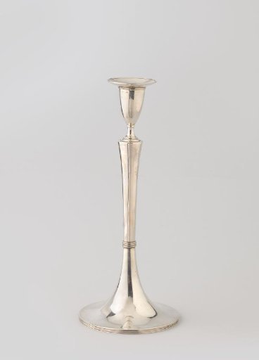 Silver candlestick on trumpet-shaped foot