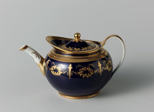 Teapot with foliate scrolls and torches